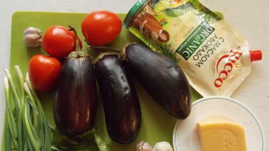 Eggplant baked in the oven with cheese and tomatoes in a different manner