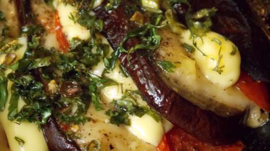 Eggplant baked in the oven with cheese and tomatoes in a different manner