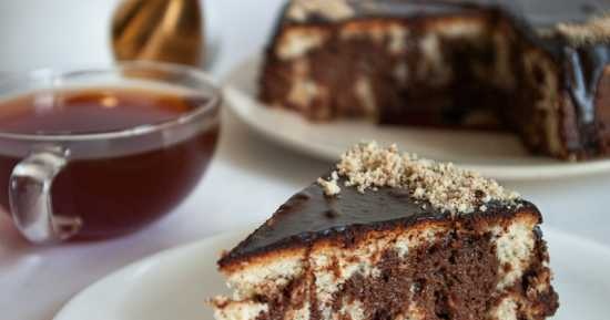 Tres leches cake with chocolate syrup