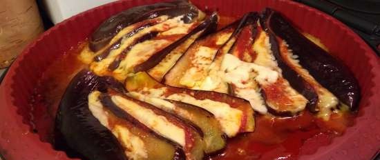 Eggplant baked in the oven with cheese and tomatoes in a different manner