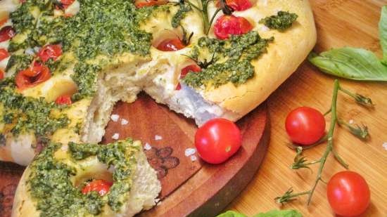 Focaccia with pesto sauce and cherry tomatoes