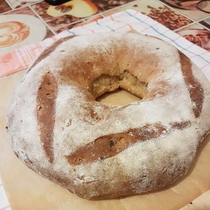 Wheat-rye bread bagel with onions (oven)