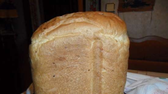 Wheat bread on kefir with cheese in a bread maker