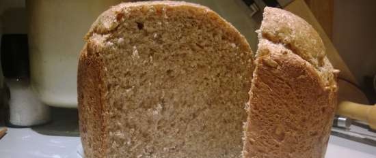 Gray bread on light beer in a bread maker